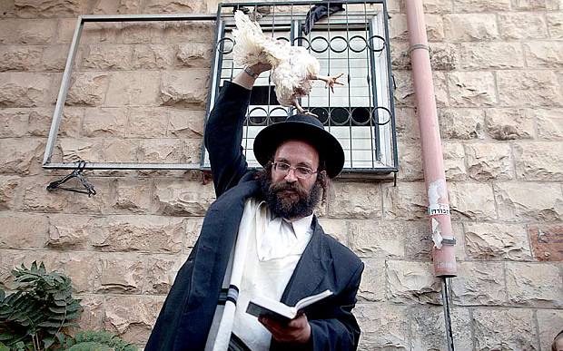 Orthodox_Jew_Physically_Abusing_Chicken_In_Public
